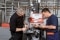 Two technicians maintaining a system.