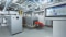 The picture shows the Vitocal 350-G Pro large heat pump in the boiler room of the Otto Lilienthal School in Cologne
